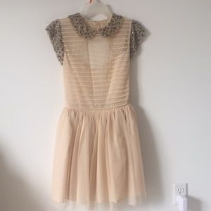 Nude dress with peter pan collar
